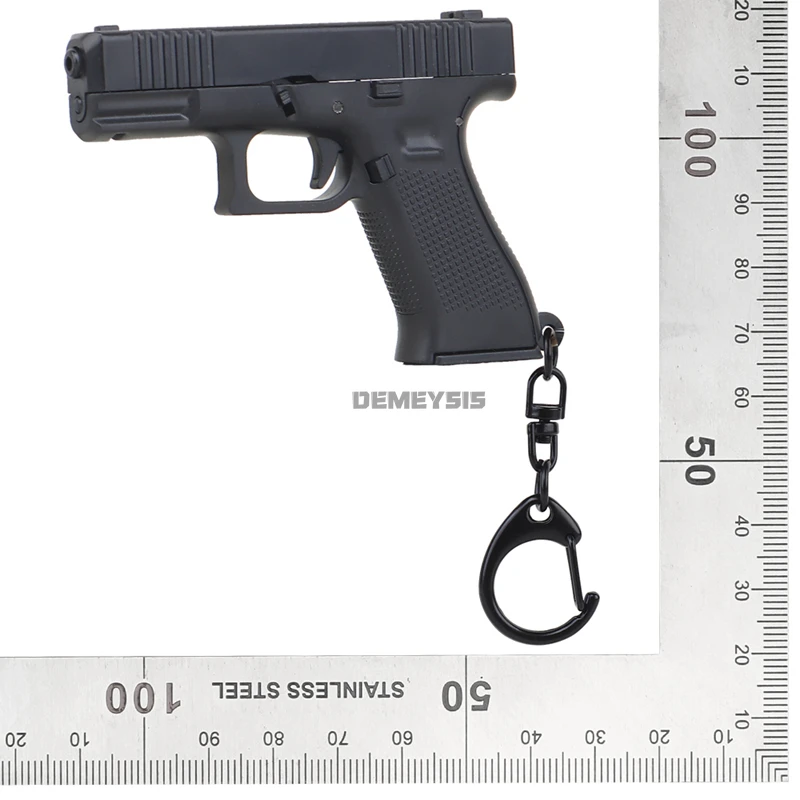 Mini G45 Pistol Shaped Keychai - đánh giá và giá Photography Magazine