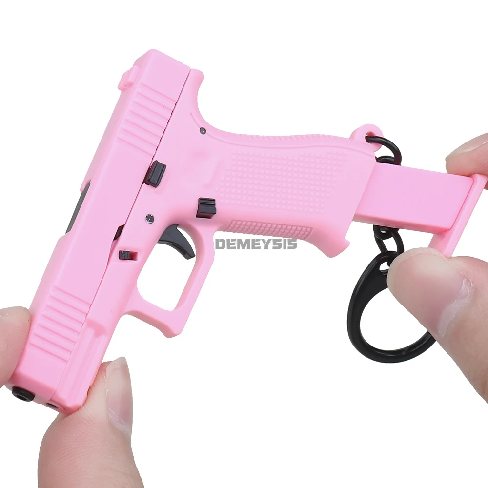 Mini G45 Pistol Shaped Keychai - đánh giá và giá Photography Magazine